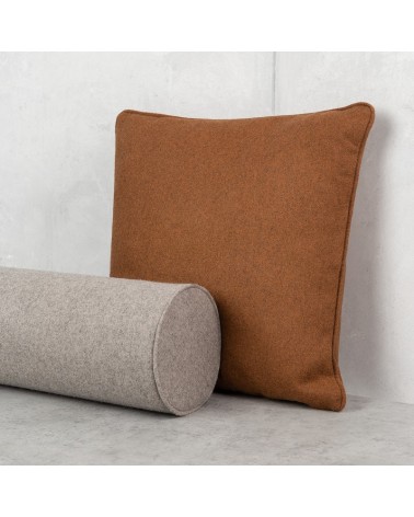 Bolster cushion from wool fabric.