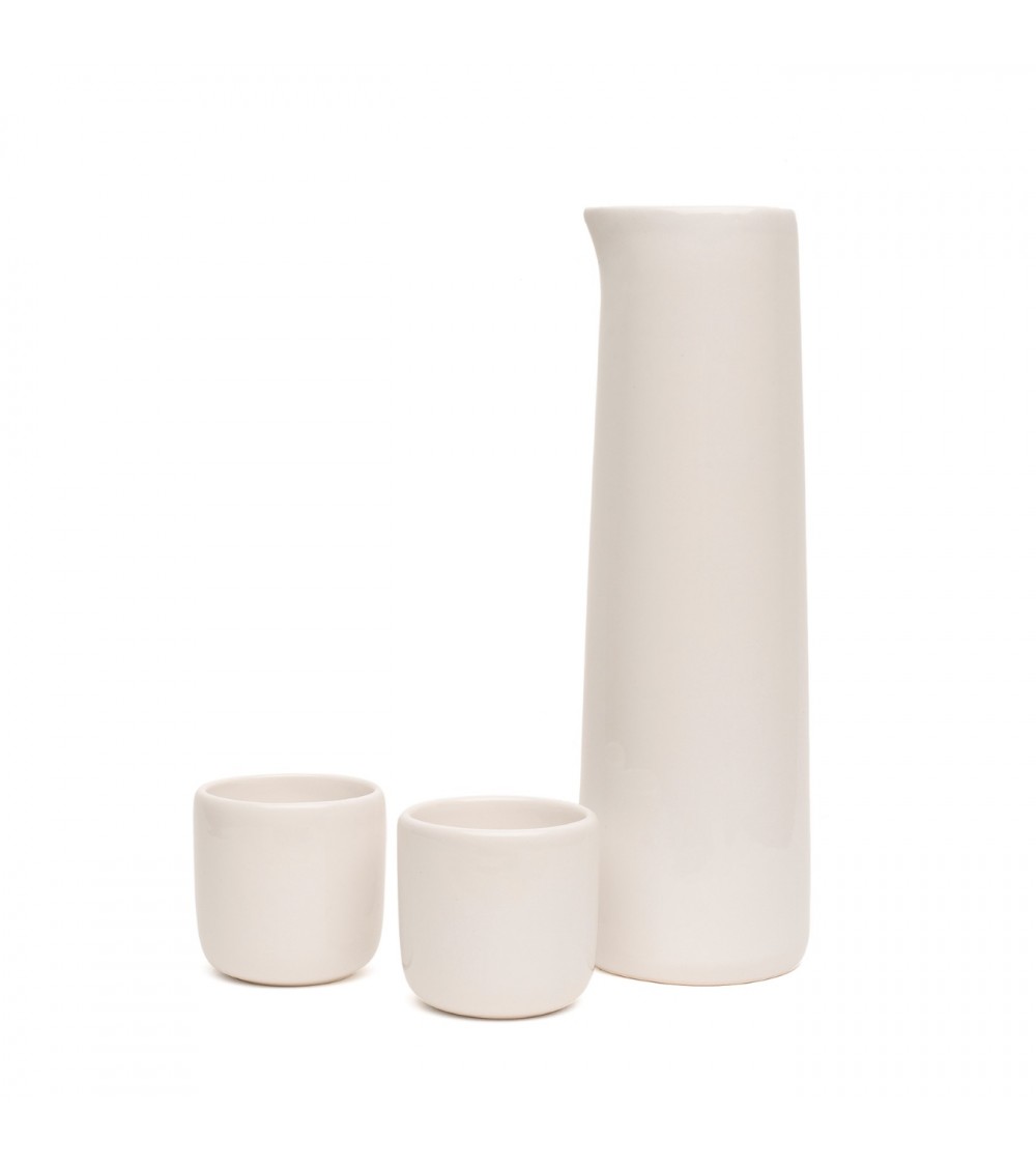white carafe with cups