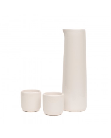 white carafe with cups